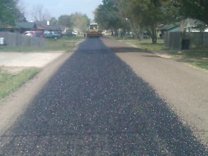 New asphalt on dirt road